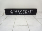 2000s Maserati dealership illuminated sign