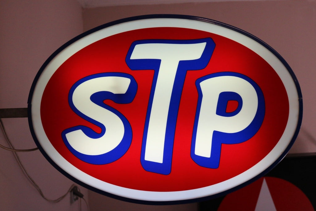 Stp Sign Exploding 1980s STP motor oil illuminated neon sign – The Sign Experience