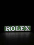 2010s Rolex dealer illuminated sign