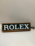 2010s Rolex dealer illuminated sign