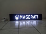 2000s Maserati dealership illuminated sign