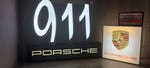 2010s Porsche 911 unique dealership illuminated sign