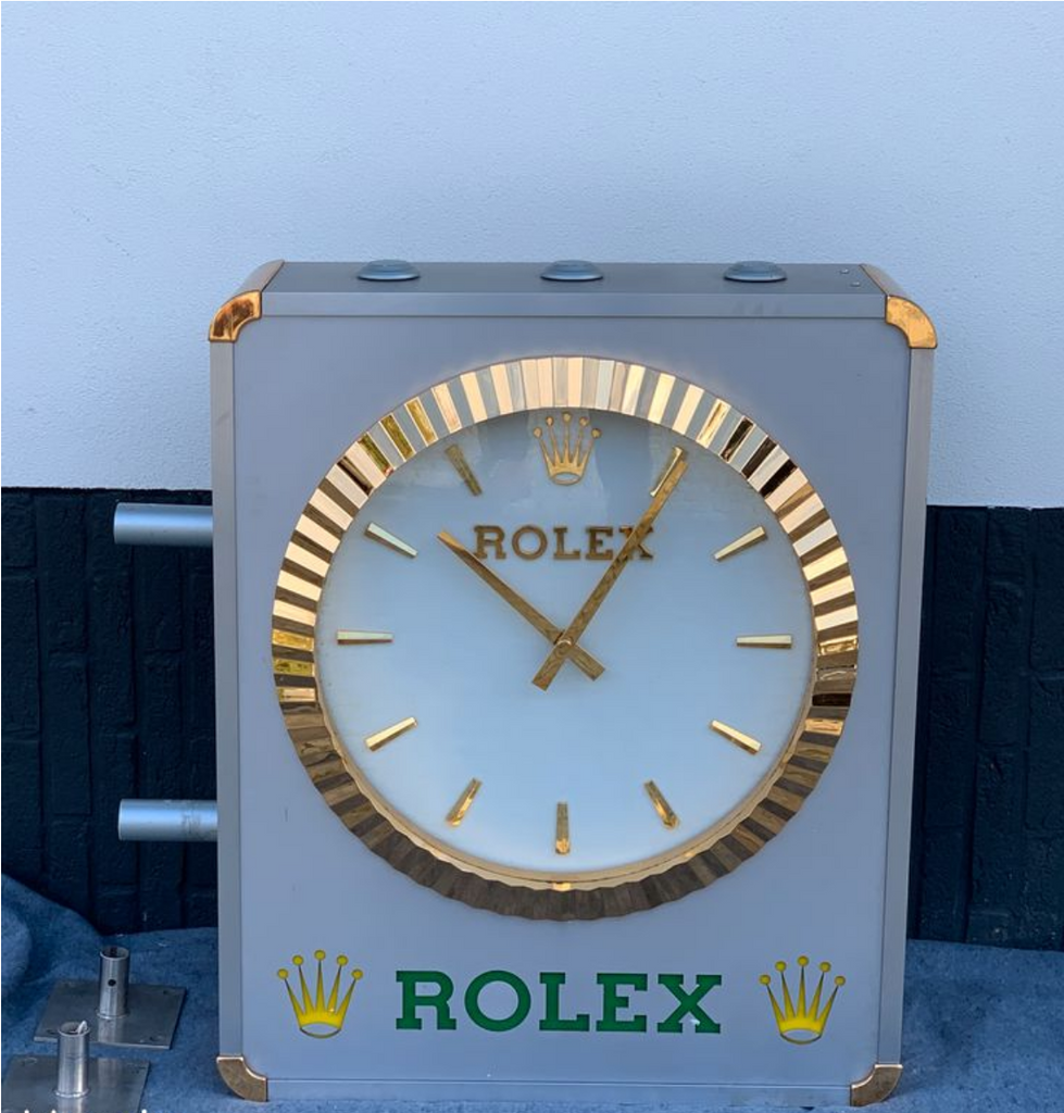 Vintage rolex 2025 wall clock