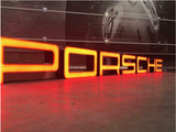 2003 Porsche official dealership very long illuminated sign