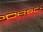 2003 Porsche official dealership very long illuminated sign