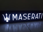 2000s Maserati dealership illuminated sign