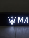 2000s Maserati dealership illuminated sign