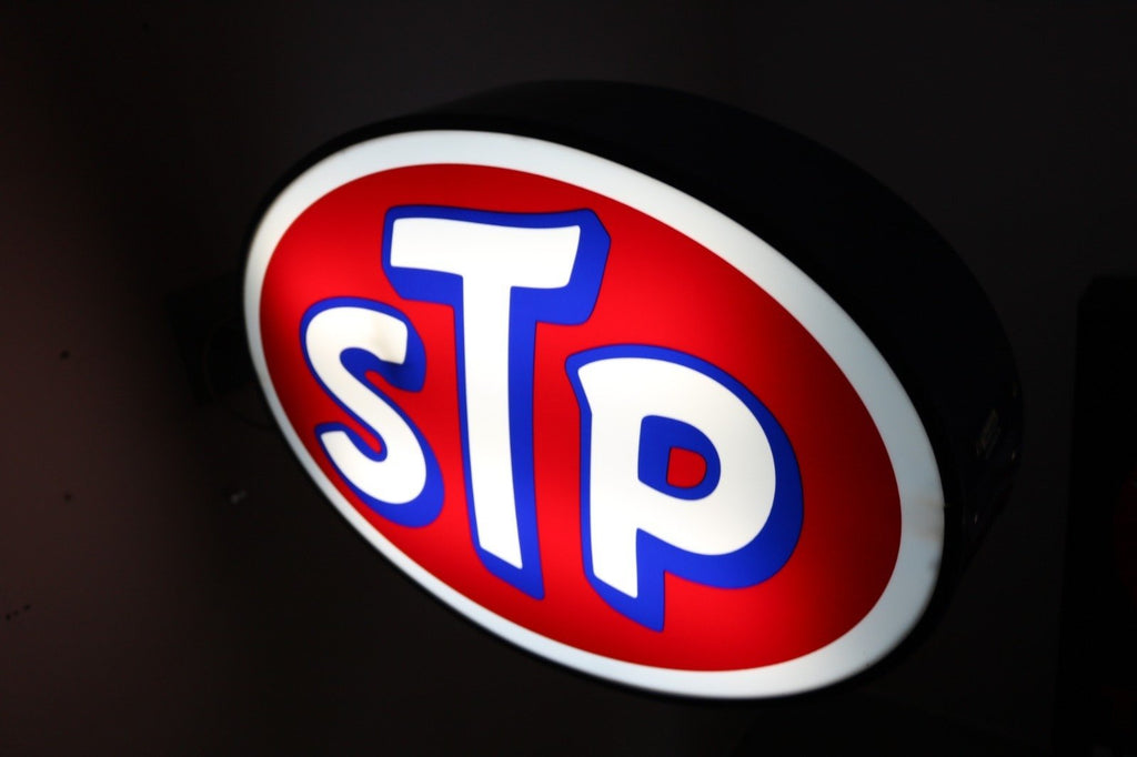 Stp Sign Exploding 1980s STP motor oil illuminated neon sign – The Sign Experience